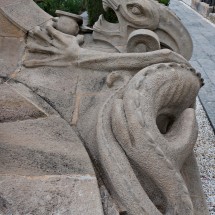 Dragon on the Pantheon that upholds skull on which the tables of law are found - broken - symbolizing the kingdom of shadows